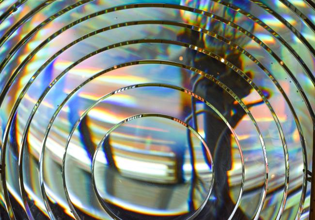 Colorful detail of fresnel lens showing the art behind the science